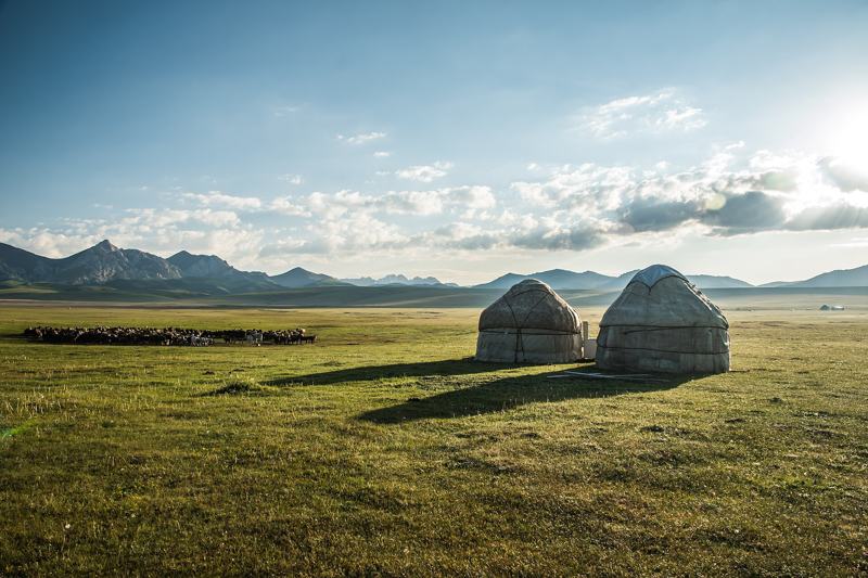 Kazakh yurts on a mountain steppe pasture