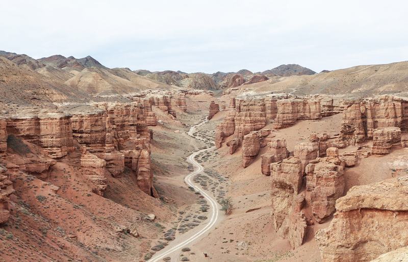 Valley of Castles in Charyn Canyon, Kazakhstan, with the trail winding between red rock towers