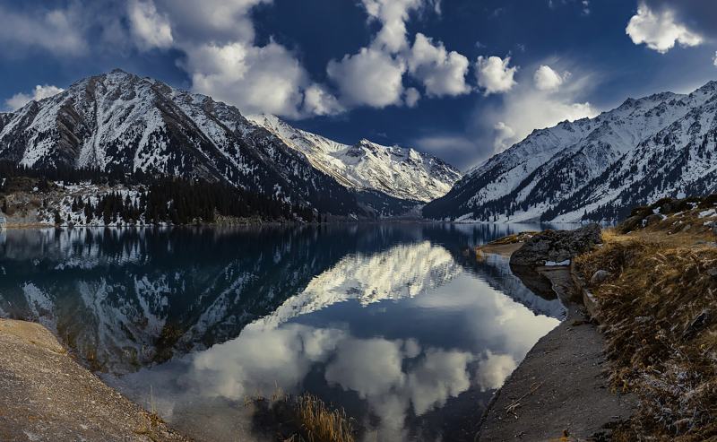 Snowy peaks reflected in Big Almaty Lake