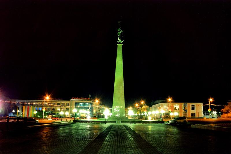 Ordabasy Square monument in Shymkent lit up at night